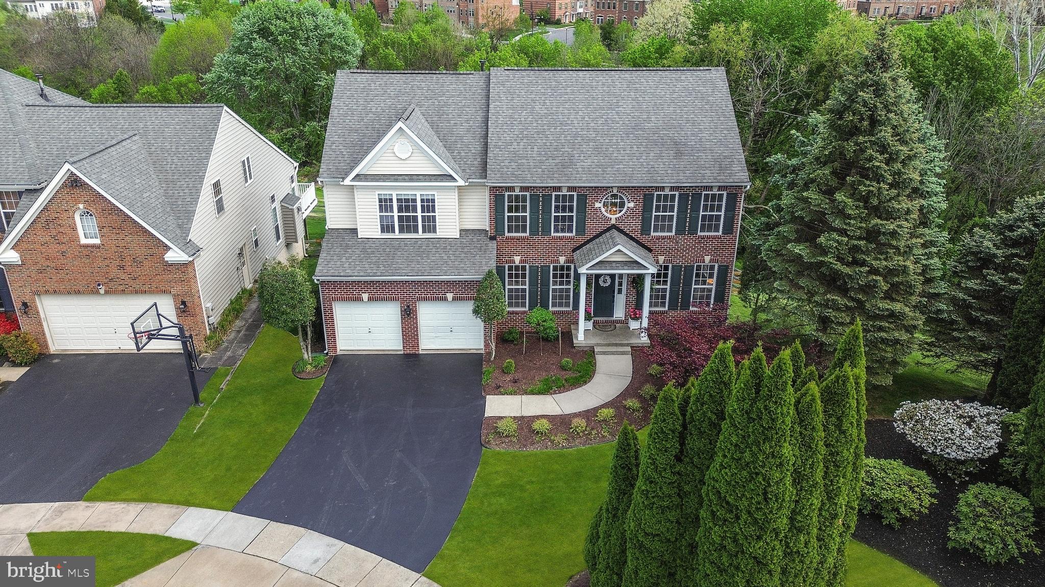 9105 Hendry Terrace Frederick, MD 21704 - Photo 39 of 51 a aerial view of a house with yard and green space