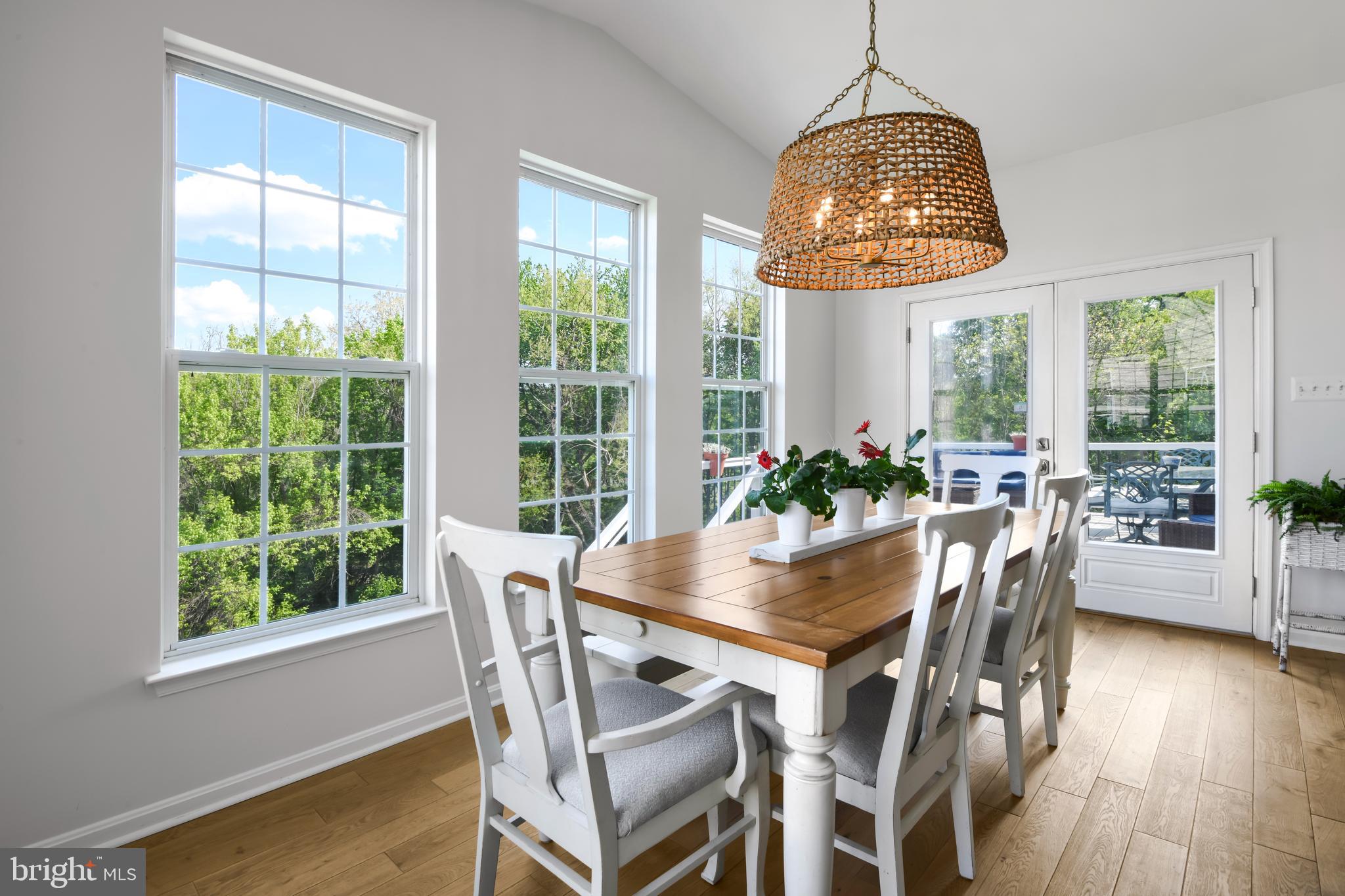 9105 Hendry Terrace Frederick, MD 21704 - Photo 4 of 51 a dining room with furniture window wooden floor