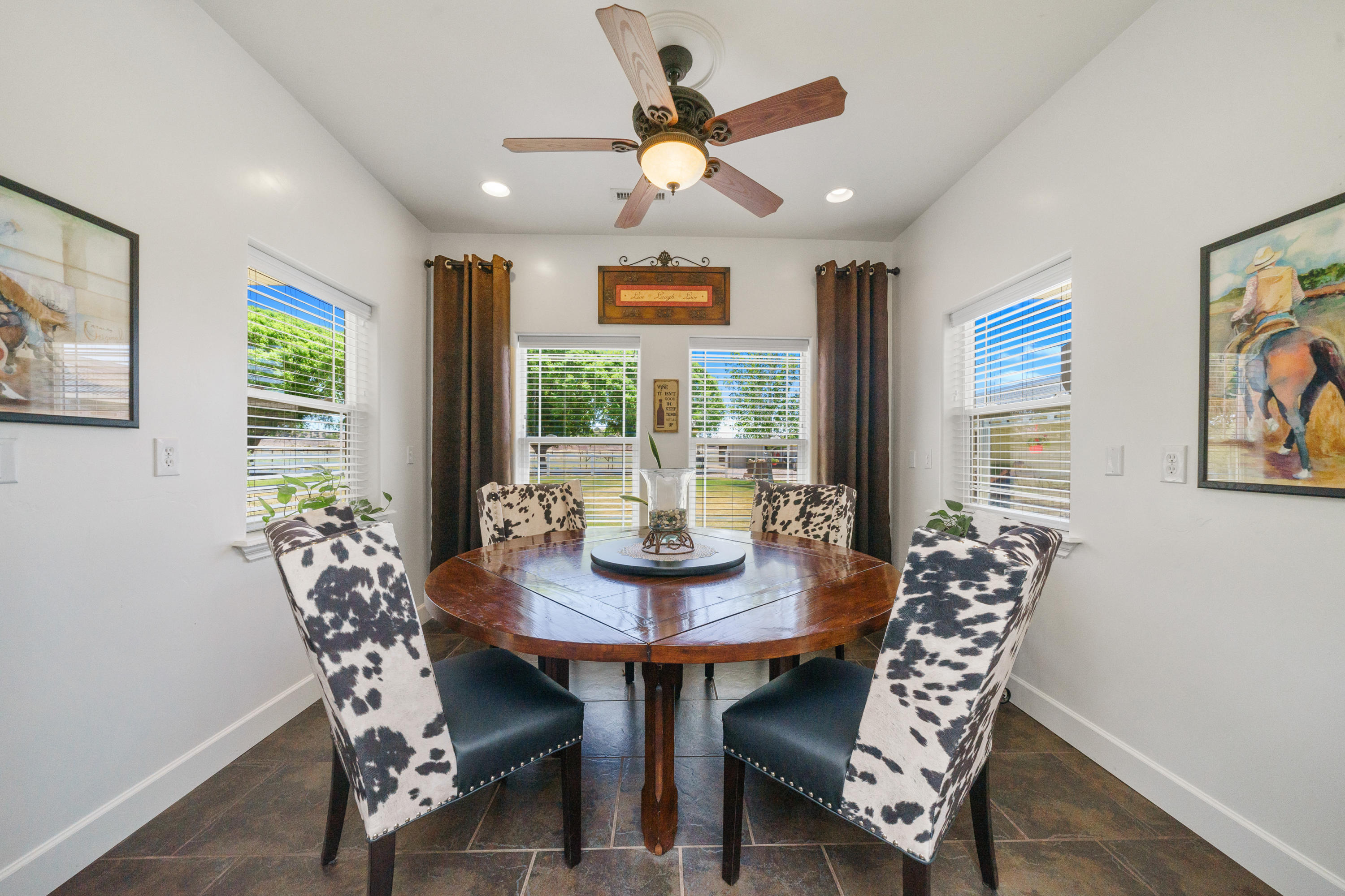 18000 North Lower Territory Road Prescott, AZ 86305 - Photo 16 of 42 a view of a dining room with furniture window and wooden floor