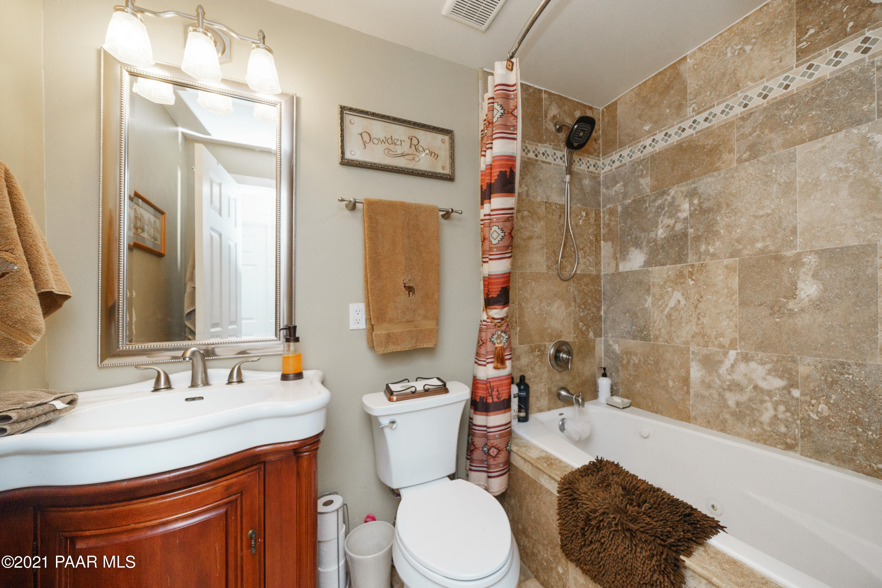 18000 North Lower Territory Road Prescott, AZ 86305 - Photo 23 of 42 a bathroom with a sink a toilet and shower
