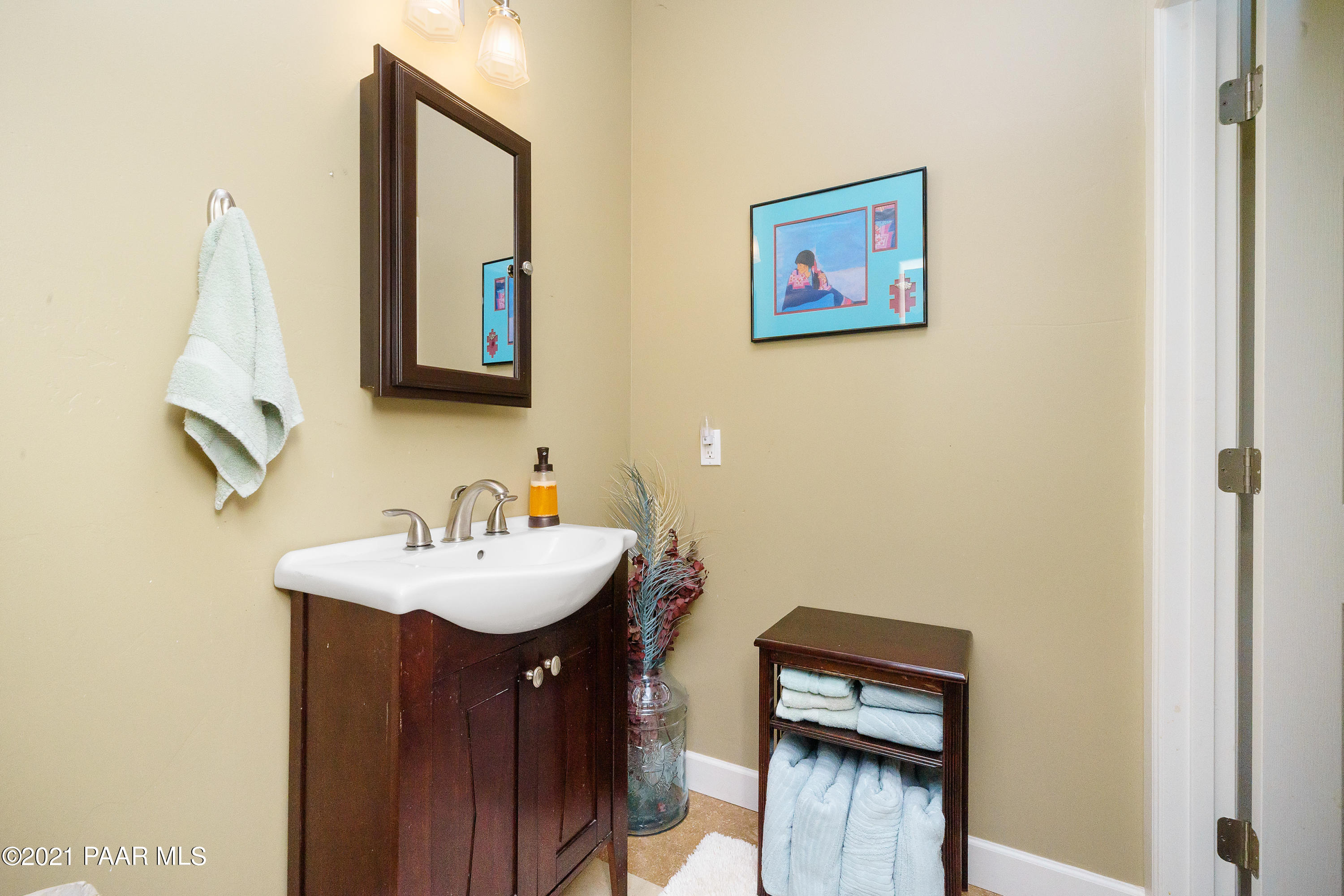 18000 North Lower Territory Road Prescott, AZ 86305 - Photo 26 of 42 a bathroom with a sink and a mirror