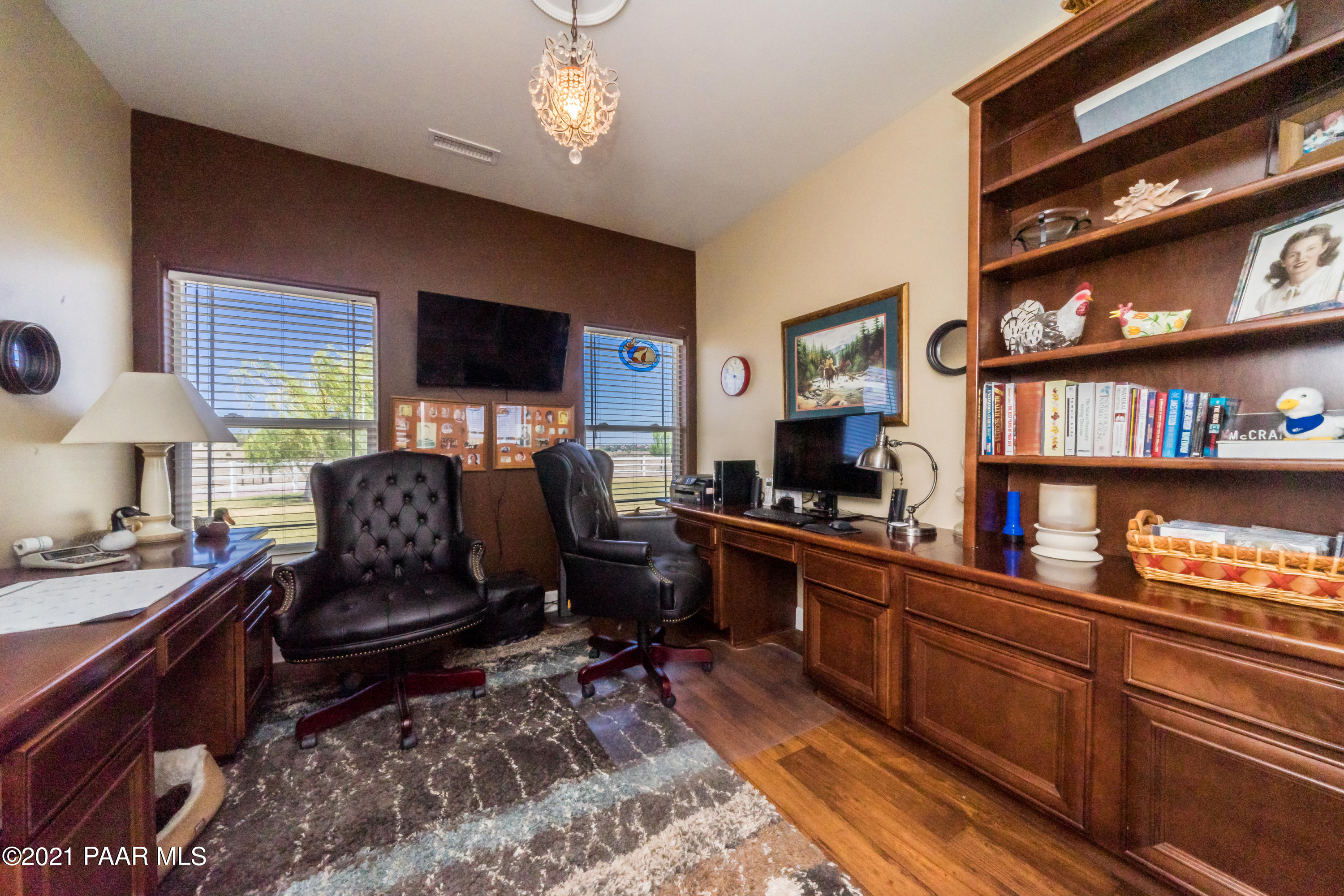 18000 North Lower Territory Road Prescott, AZ 86305 - Photo 28 of 42 a living room with furniture cabinets and a flat screen tv