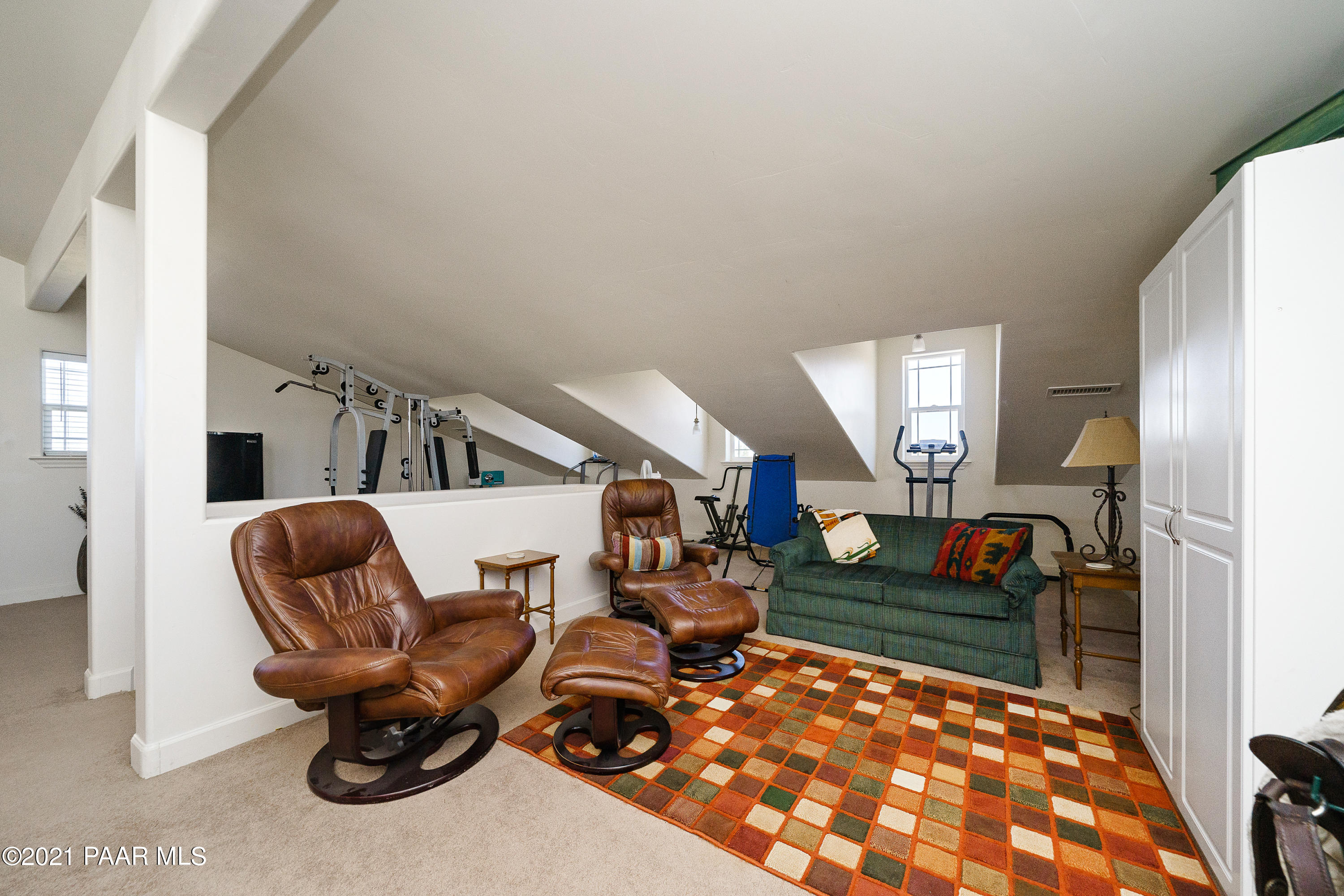 18000 North Lower Territory Road Prescott, AZ 86305 - Photo 29 of 42 a living room with furniture a rug and a large window