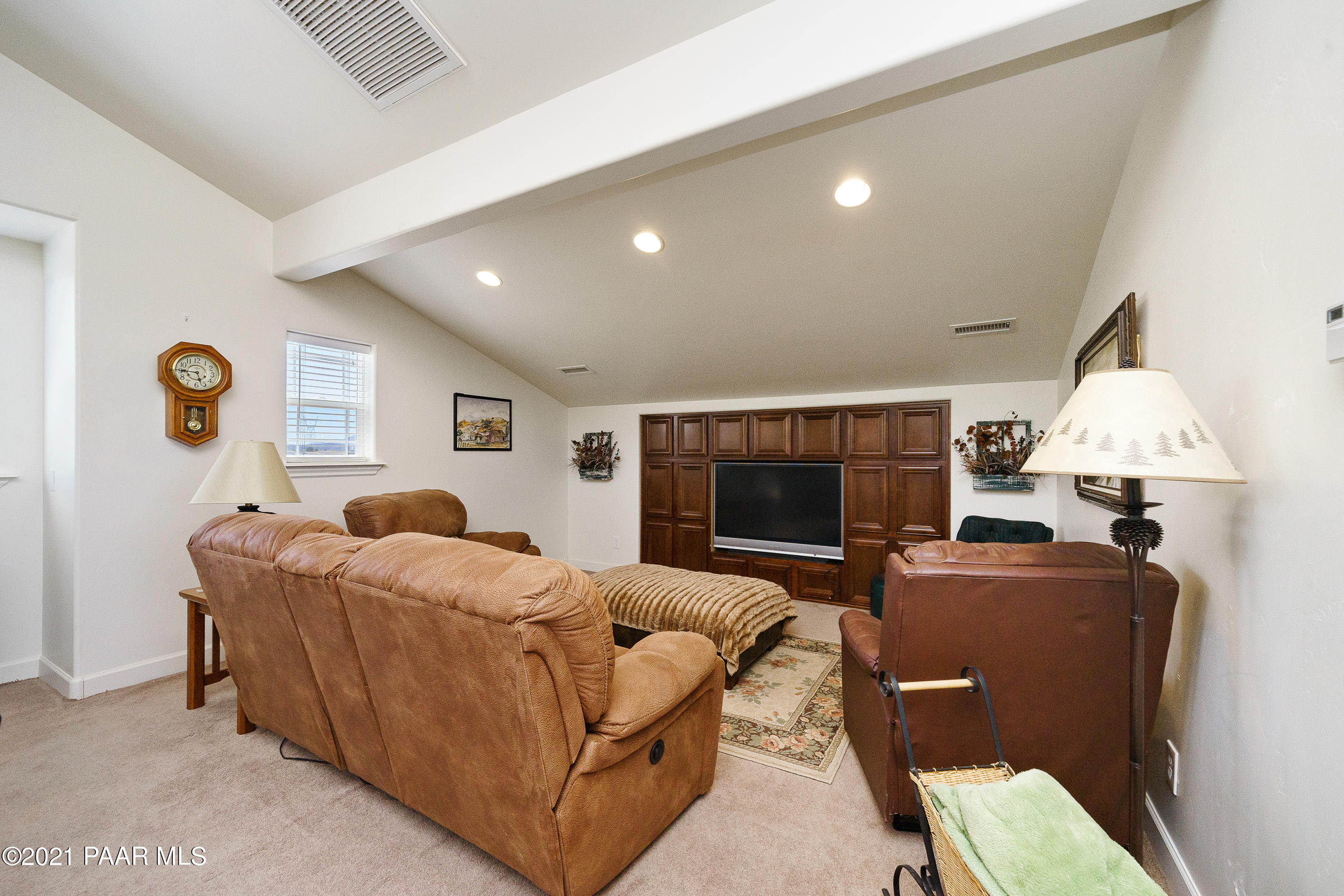 18000 North Lower Territory Road Prescott, AZ 86305 - Photo 32 of 42 a living room with furniture and a fireplace
