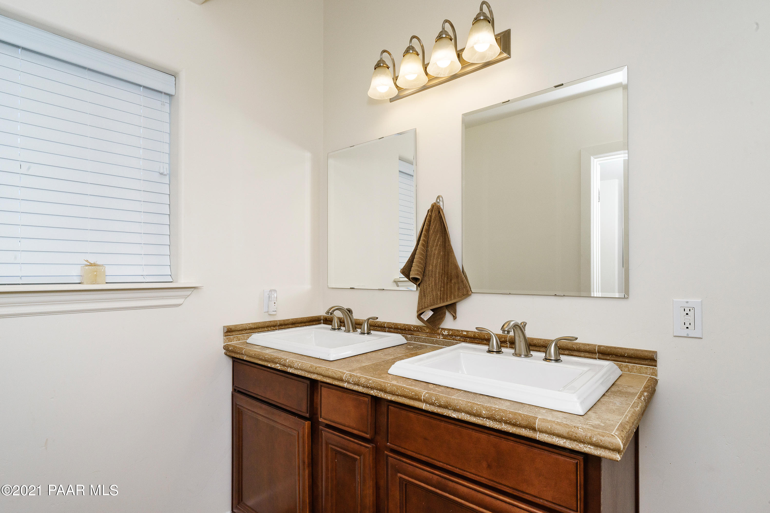 18000 North Lower Territory Road Prescott, AZ 86305 - Photo 33 of 42 a bathroom with a sink and a mirror