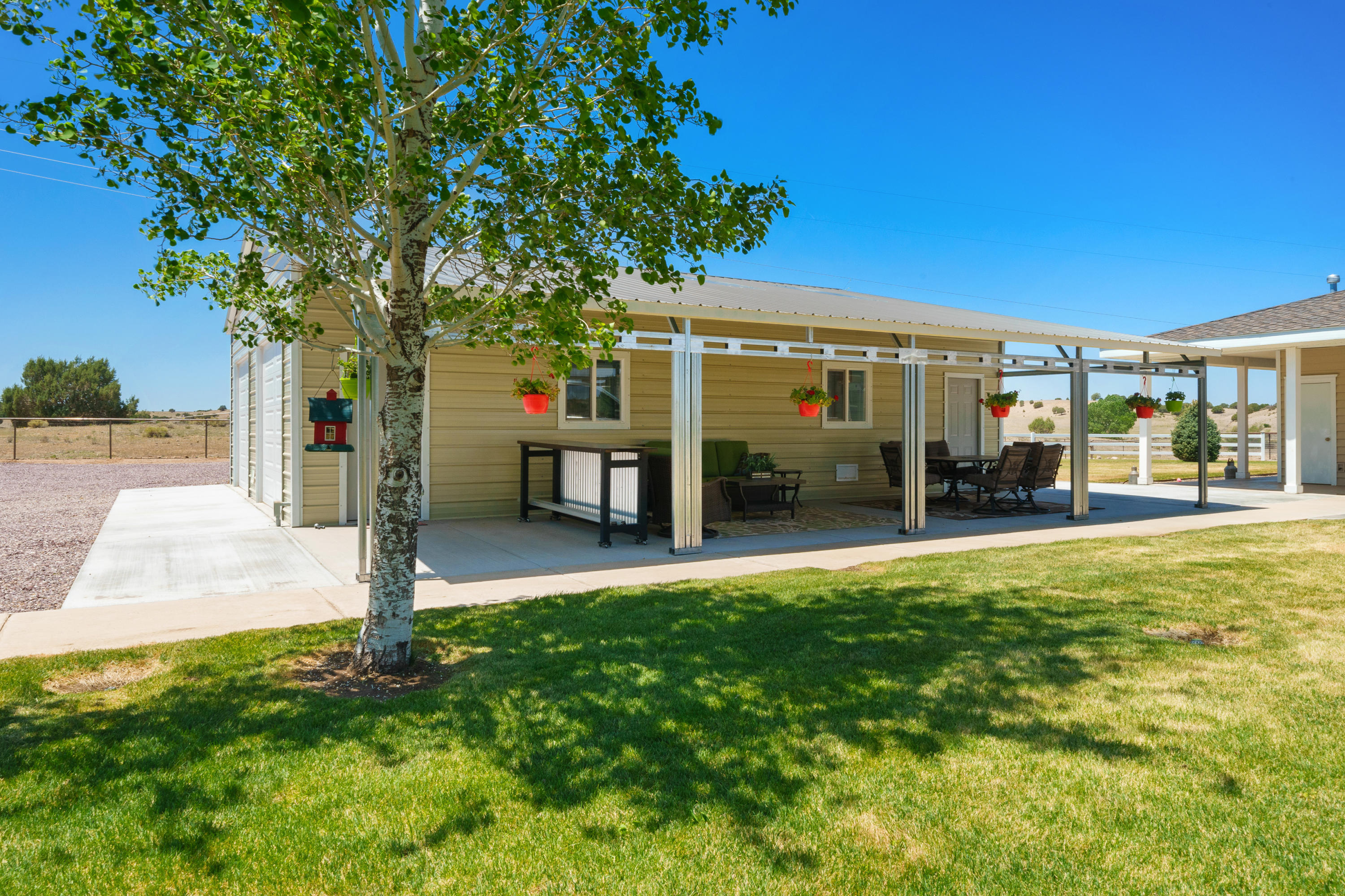 18000 North Lower Territory Road Prescott, AZ 86305 - Photo 36 of 42 a view of a house with backyard and a tree