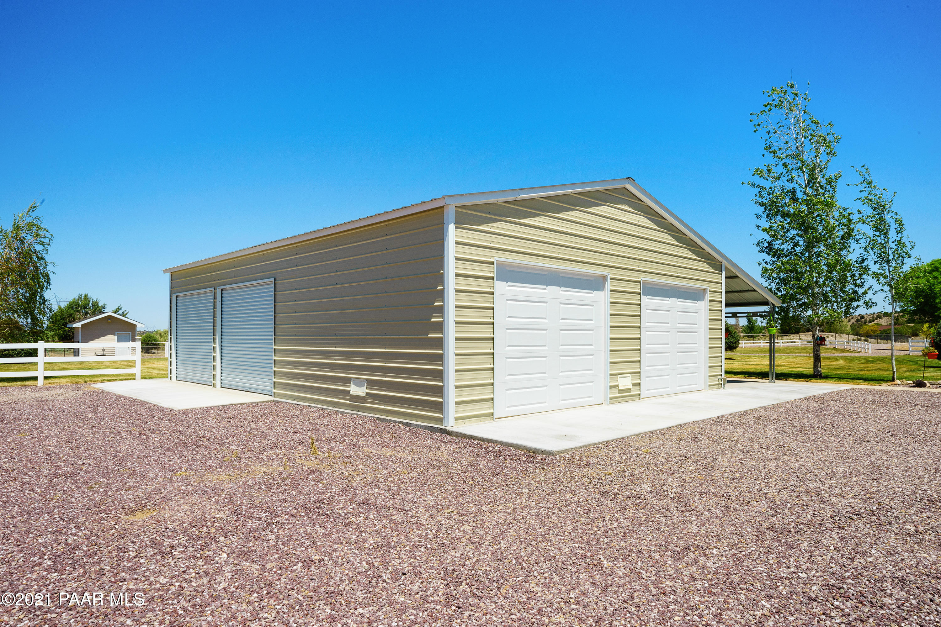 18000 North Lower Territory Road Prescott, AZ 86305 - Photo 37 of 42 a view of a house with a backyard and a tree