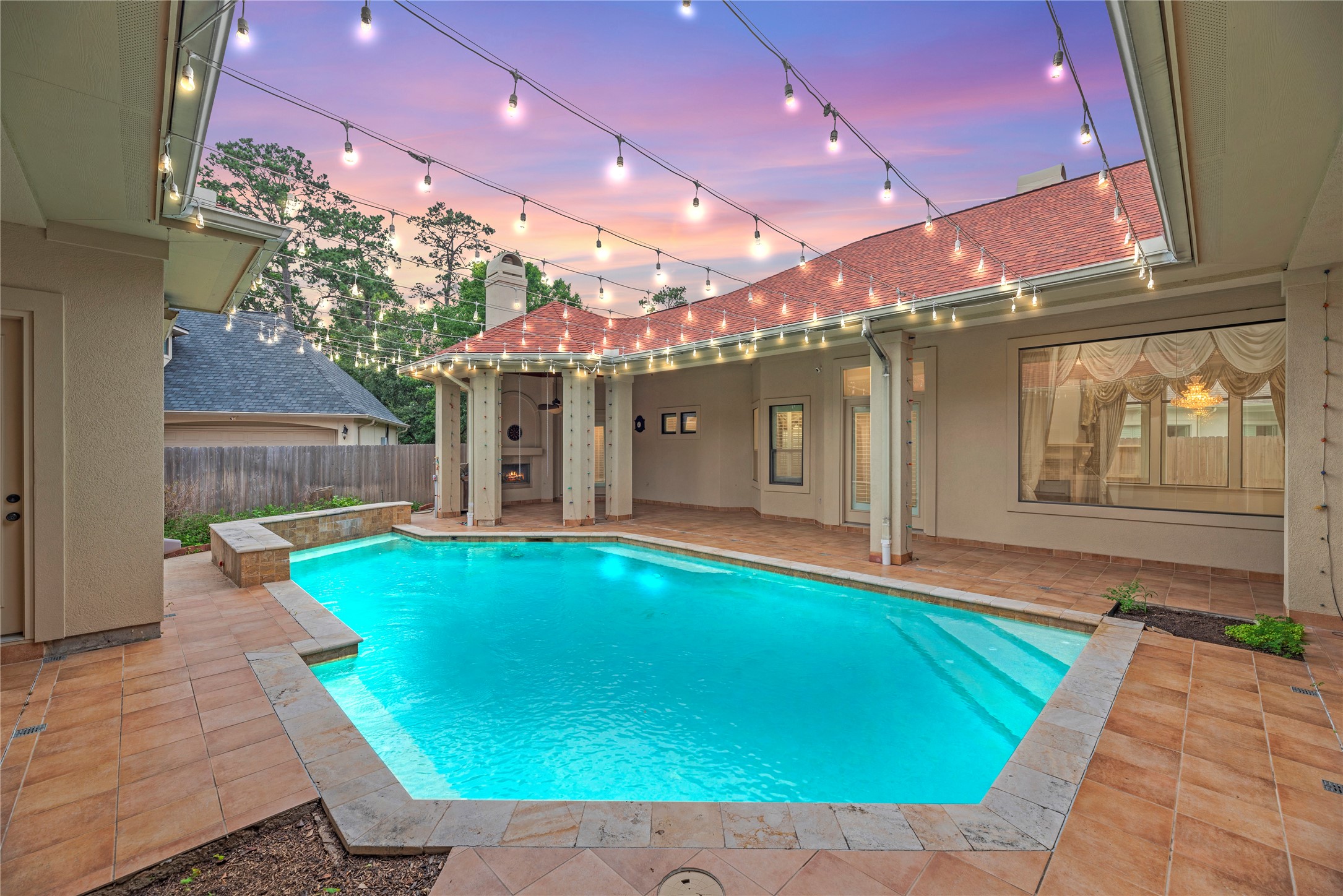 16610 Champagne Falls Court Spring, TX 77379 - Photo 2 of 45 a view of a house with a patio and a yard