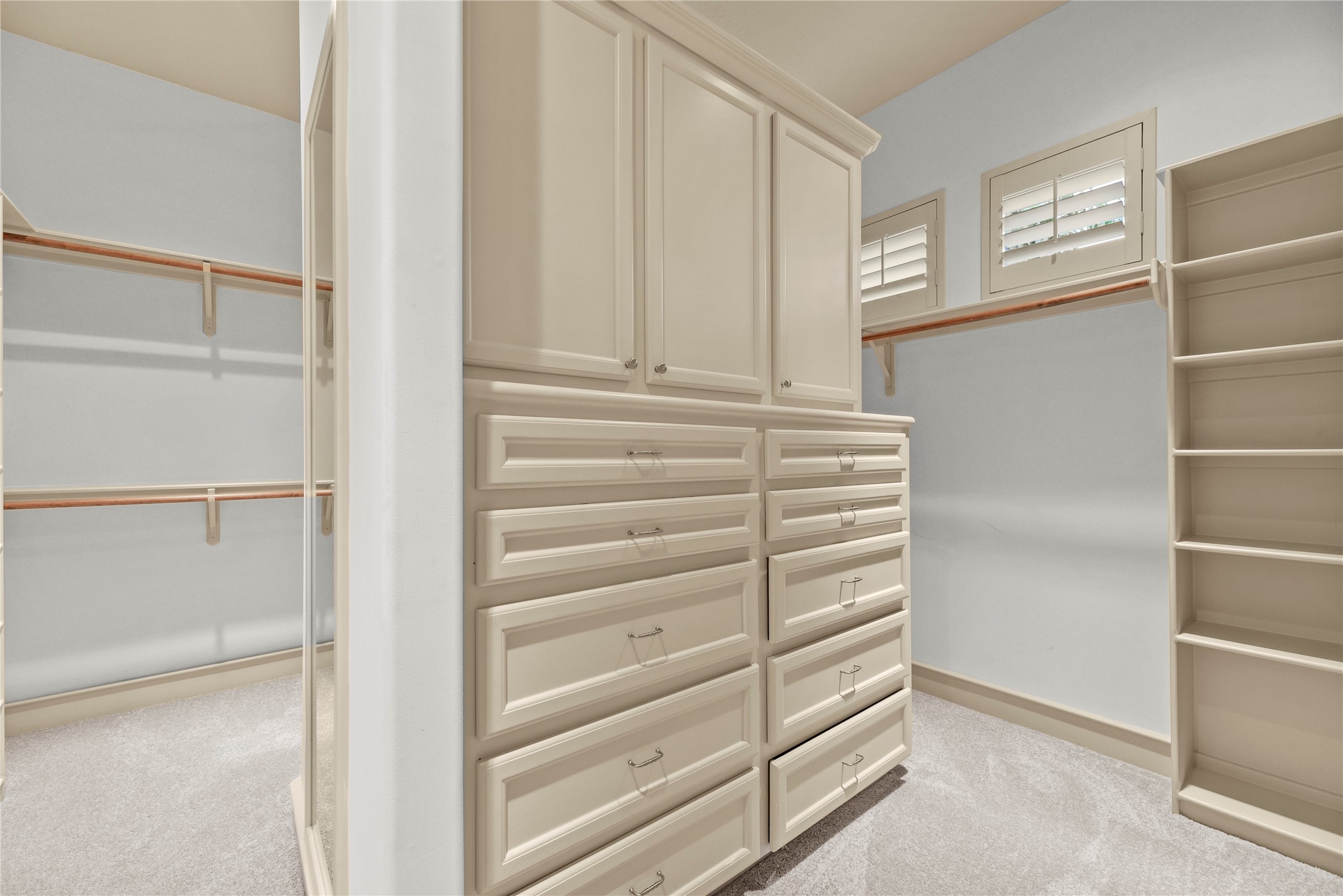 16610 Champagne Falls Court Spring, TX 77379 - Photo 22 of 45 a view of walk in closet with empty racks