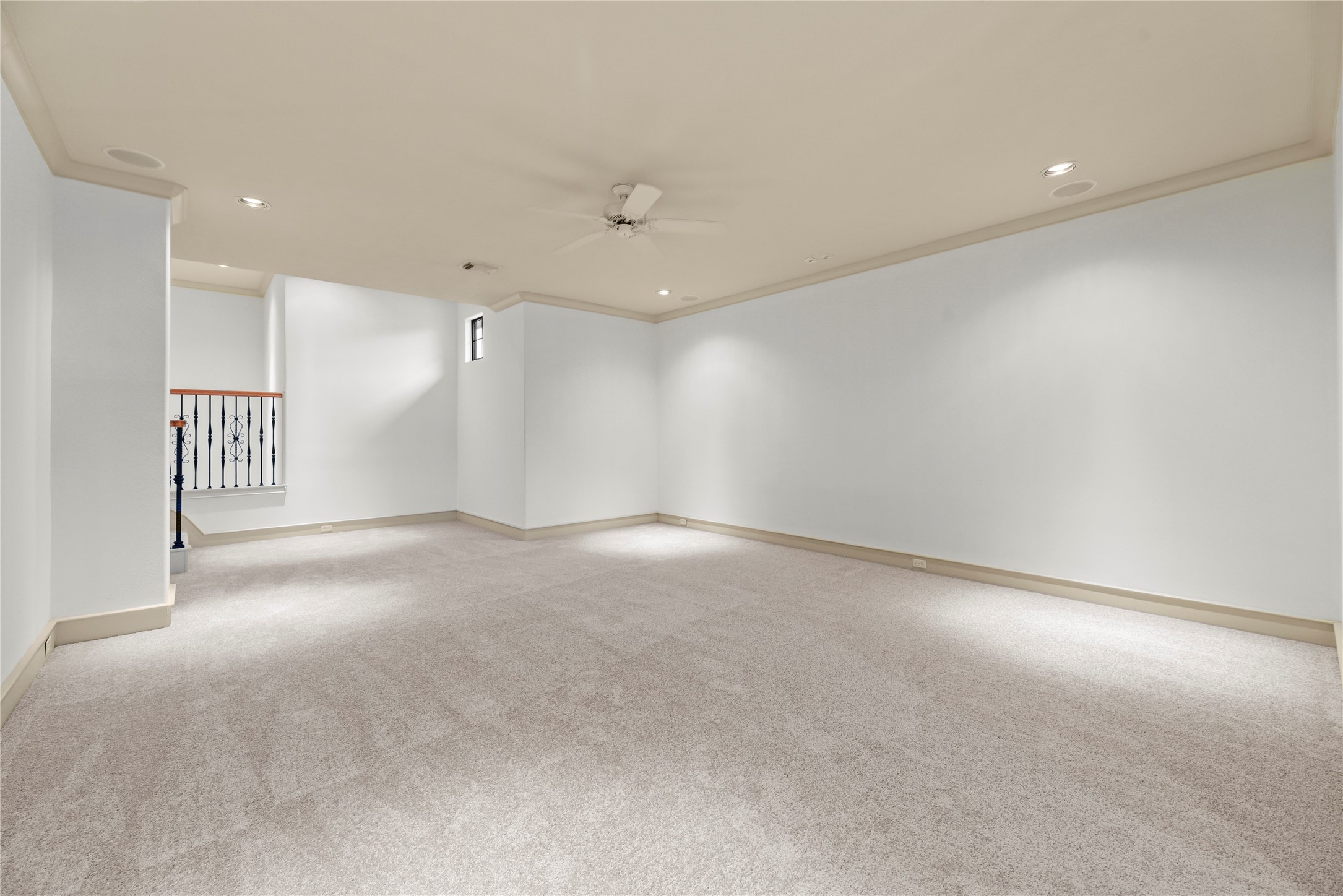 16610 Champagne Falls Court Spring, TX 77379 - Photo 30 of 45 an empty room with staircase and a ceiling fan