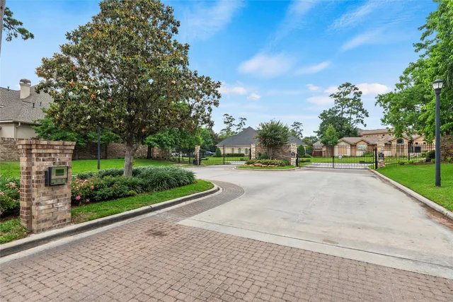 a view of a lake with houses in the back