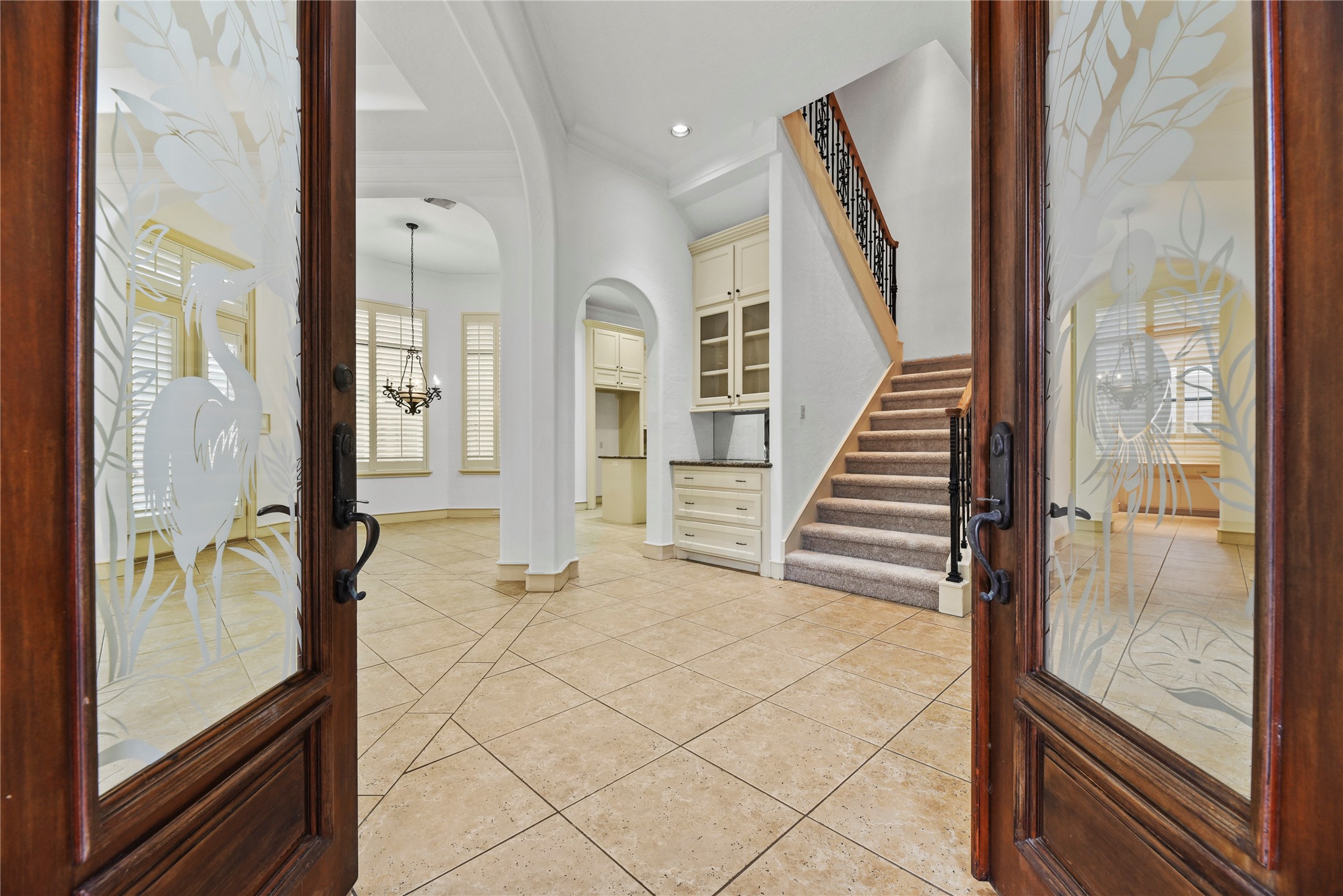 16610 Champagne Falls Court Spring, TX 77379 - Photo 5 of 45 a view of a hallway with wooden floor and staircase