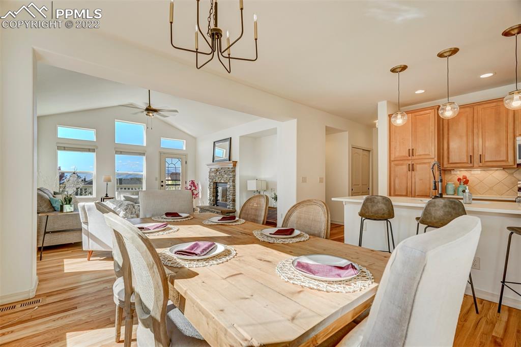2323 Cinnabar Road Colorado Springs, CO 80921 - Photo 9 of 50 a view of a dining room with furniture