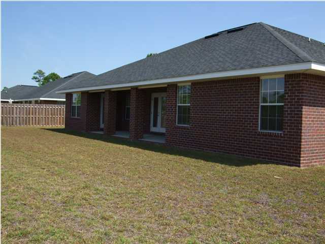 34 Shipwreck Road Santa Rosa Beach, FL 32459 - Photo 2 of 6 a house view with a backyard space