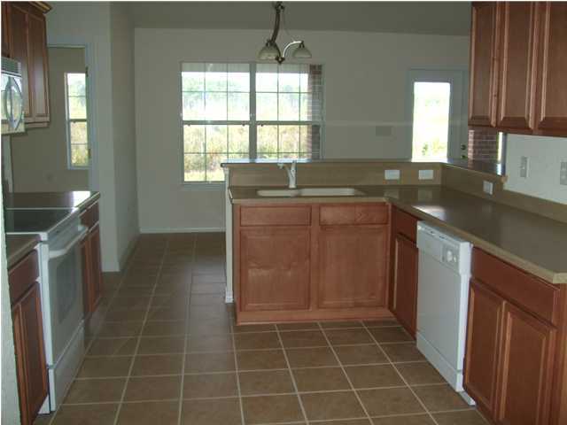 34 Shipwreck Road Santa Rosa Beach, FL 32459 - Photo 5 of 6 a kitchen with a sink a counter top space and cabinets