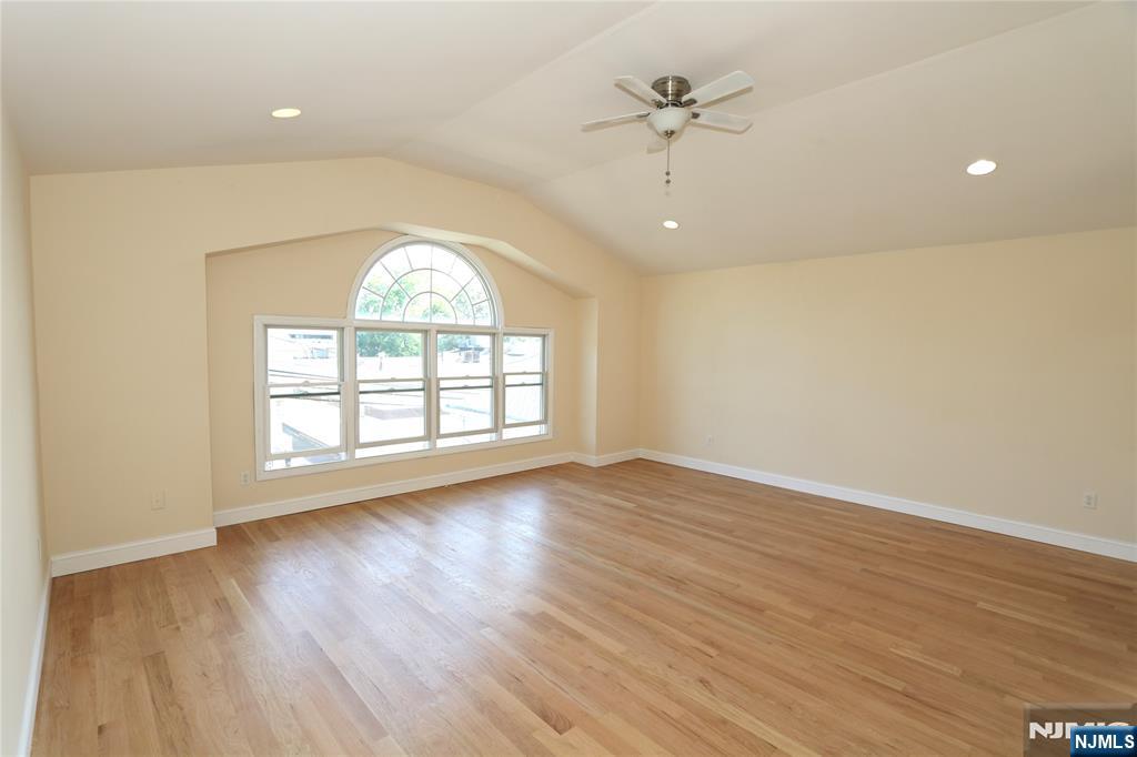 23 Main Avenue Wallington, NJ 07057 - Photo 7 of 29 wooden floor in an empty room with a window