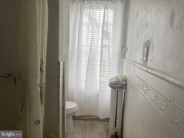 5630 Walnut Street, Unit 2 Philadelphia, PA 19139 - Photo 15 of 28 a bathroom with a shower