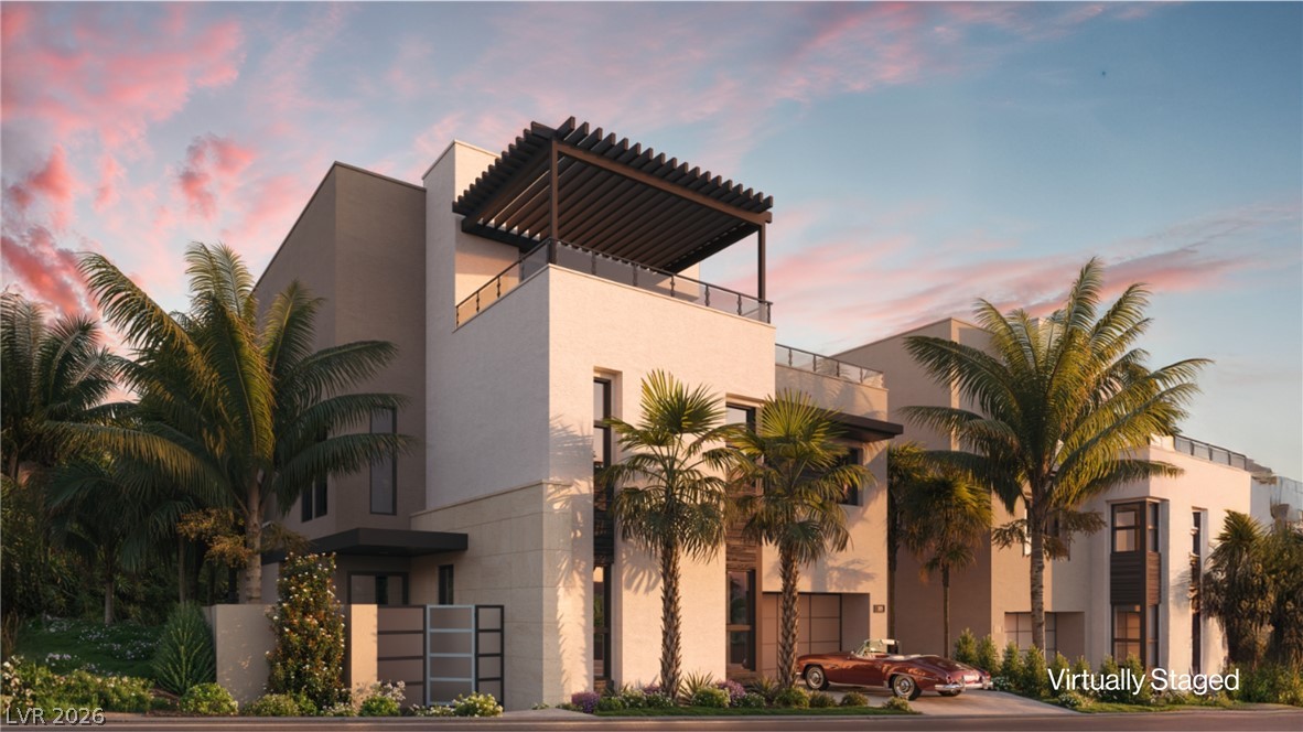 507 Overlook Rim Drive Henderson, NV 89012 - Photo 1 of 22 Modern architecture with clean lines and a third-story pergola which offers sophisticated outdoor living.