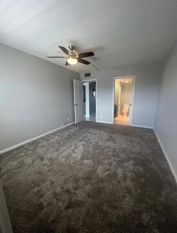 3050 Wolverton C, Unit 3050 Boca Raton, FL 33434 - Photo 14 of 19 a view of empty room with a fan