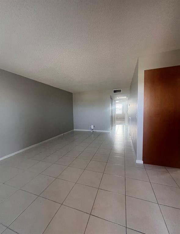3050 Wolverton C, Unit 3050 Boca Raton, FL 33434 - Photo 17 of 19 a view of an empty room