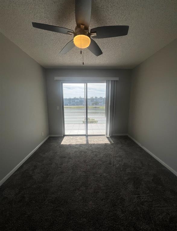 3050 Wolverton C, Unit 3050 Boca Raton, FL 33434 - Photo 7 of 19 a view of empty room with a window