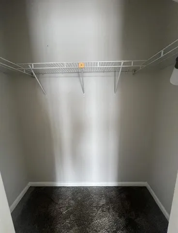 a view of a room with racks on the wall