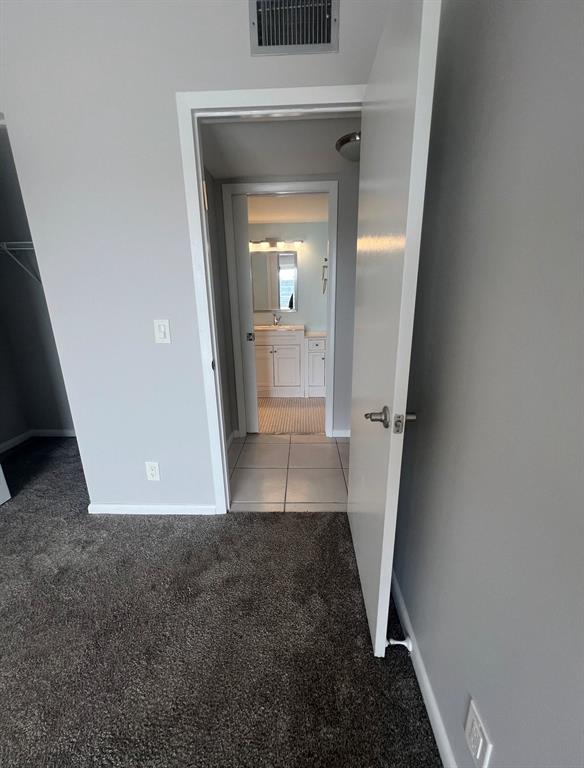3050 Wolverton C, Unit 3050 Boca Raton, FL 33434 - Photo 10 of 19 a view of a hallway view with staircase