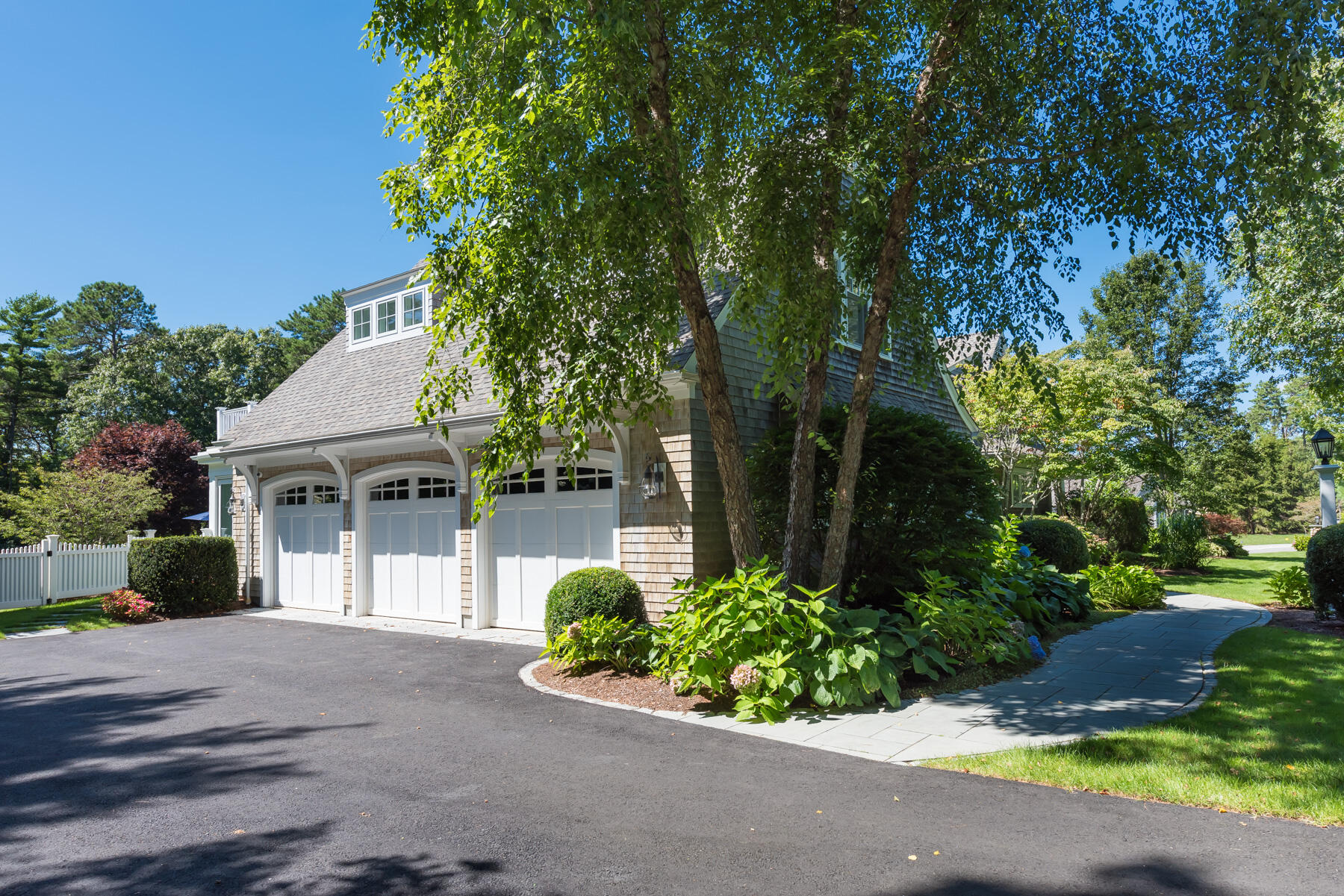 350 Windswept Way Osterville, MA 02655 - Photo 28 of 32 front view of a house with a yard