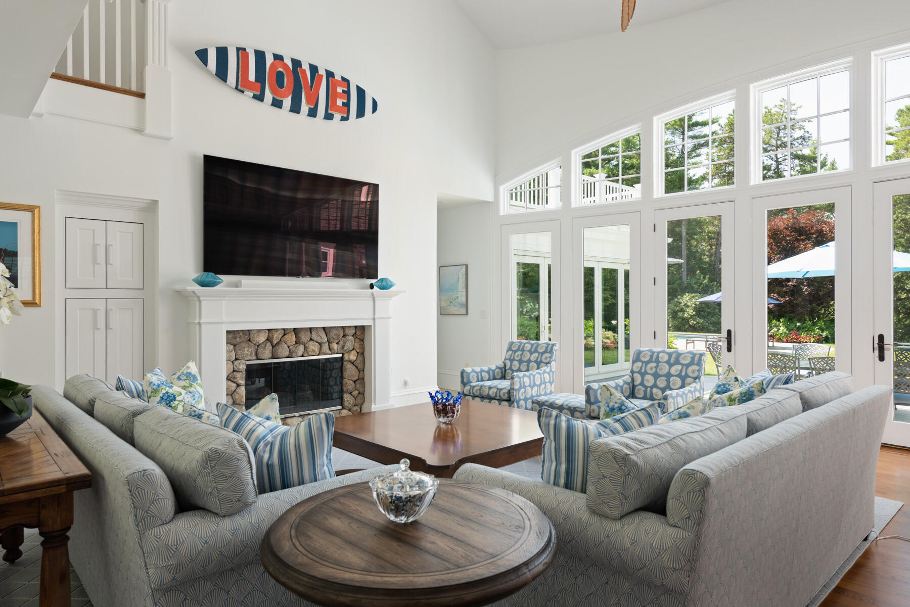 350 Windswept Way Osterville, MA 02655 - Photo 7 of 32 a living room with furniture fireplace and a flat screen tv