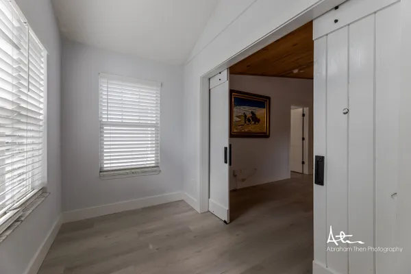 an empty room that has a window