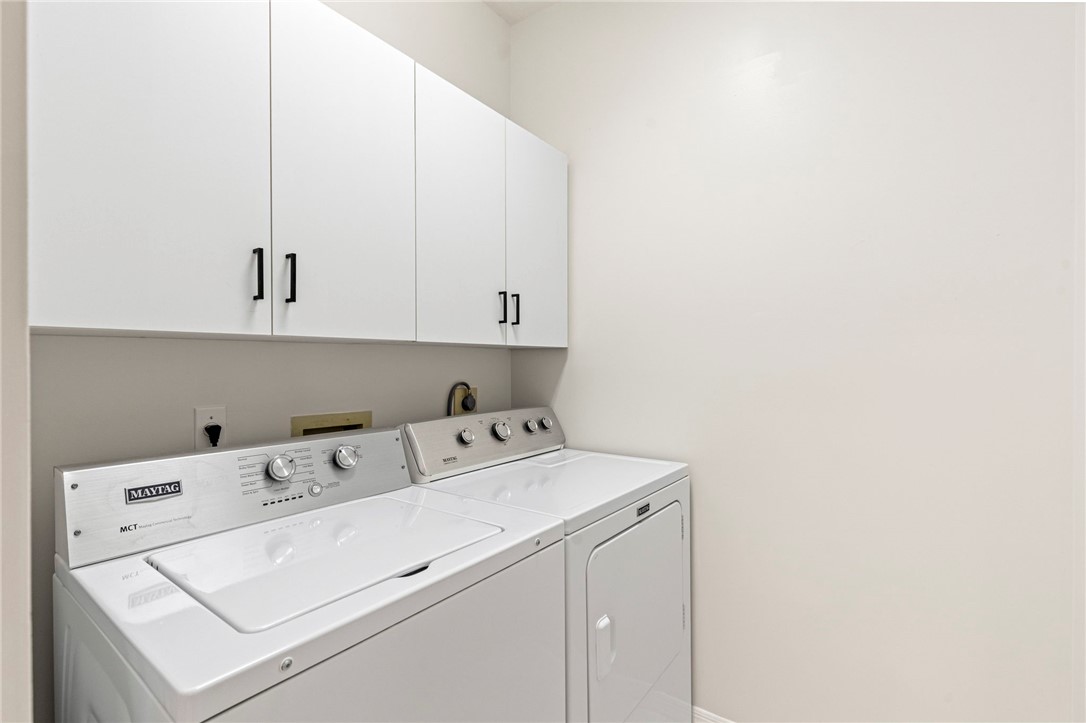 750 Timber Ridge Trail Southwest Vero Beach, FL 32962 - Photo 21 of 26 a utility room with dryer and washer
