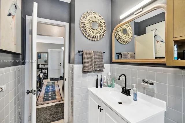 a living room with lots of gym equipment