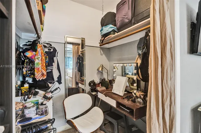 a bathroom with a sink and shower