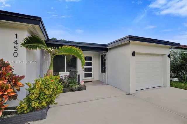 a living room with furniture fireplace and flat screen tv
