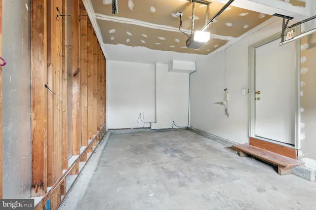 a view of a room with wooden walls