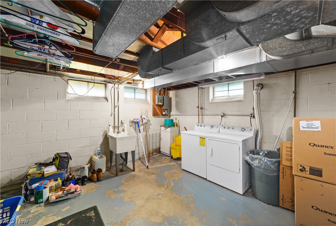 16650 Libby Road Maple Heights, OH 44137 - Photo 17 of 25 Basement with washer and dryer
