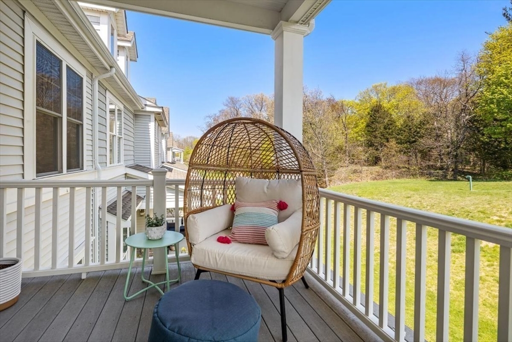 159 Hms Stayner Drive, Unit 159 Hingham, MA 02043 - Photo 15 of 35 a view of a balcony with a swing