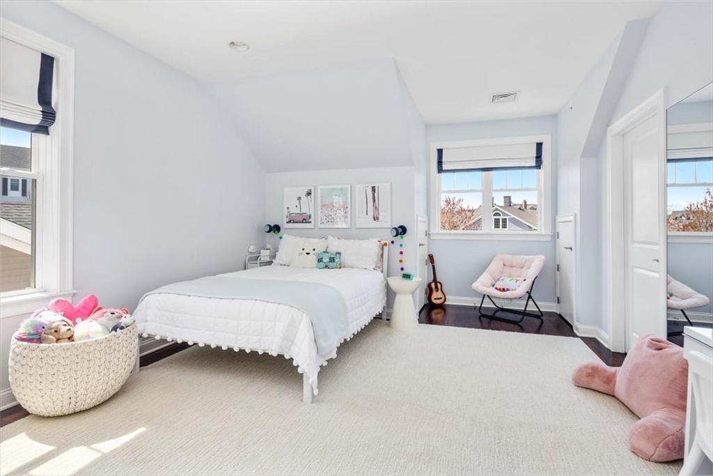 159 Hms Stayner Drive, Unit 159 Hingham, MA 02043 - Photo 16 of 35 a bedroom with bed and window