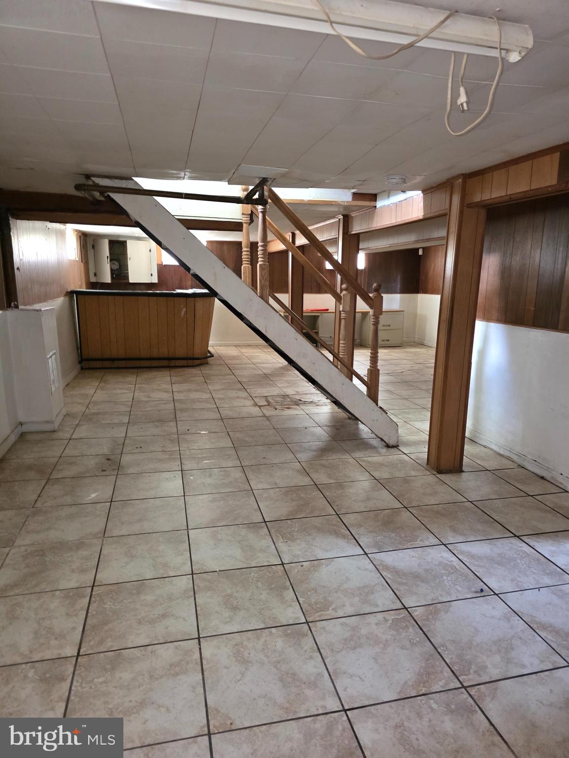 7313 Beech Avenue Baltimore, MD 21206 - Photo 14 of 17 a lobby with glass door and glass windows