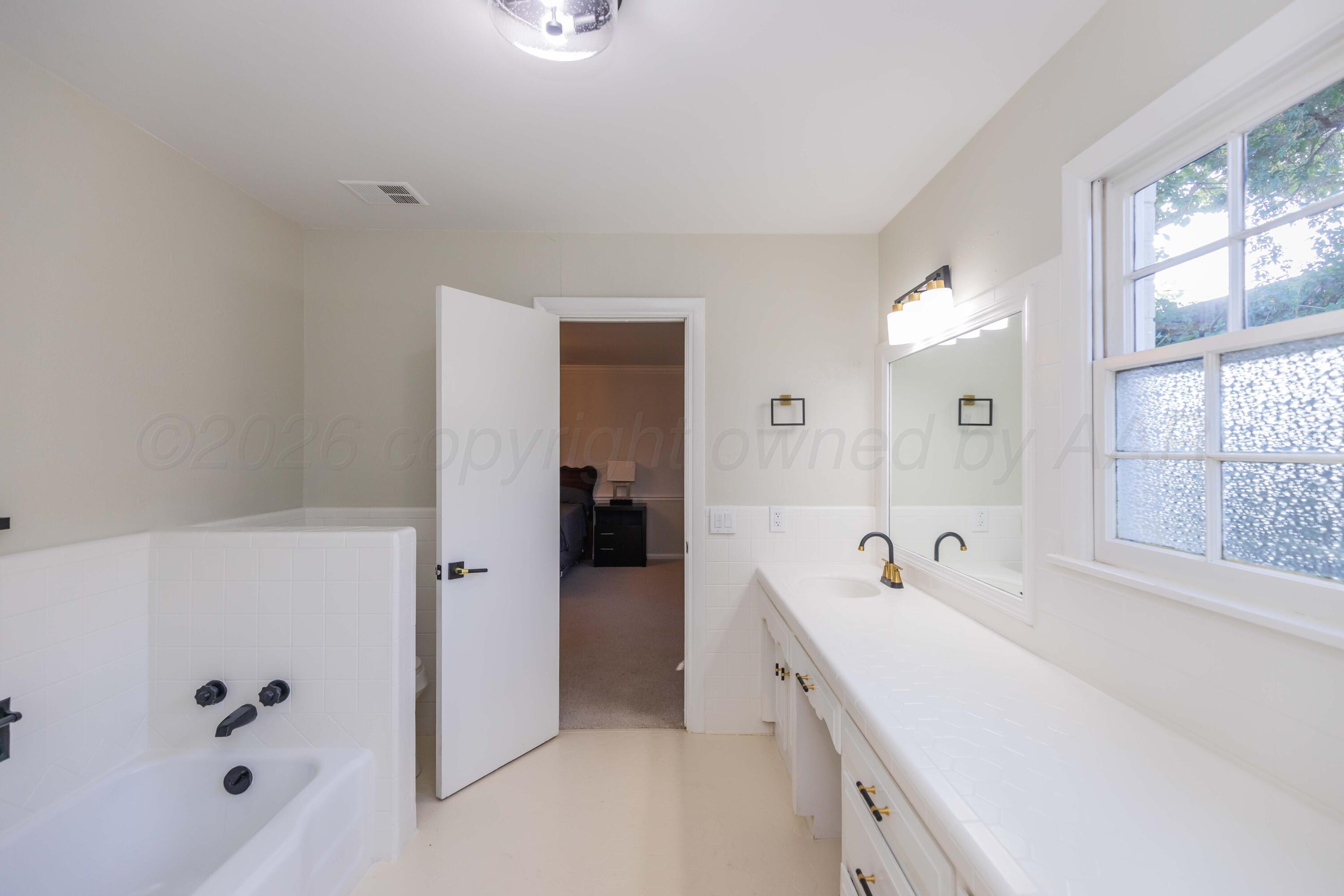 4802 Olsen Boulevard Amarillo, TX 79106 - Photo 10 of 20 MASTER BATH VIEW 3