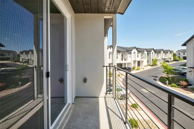 a view of balcony and a patio