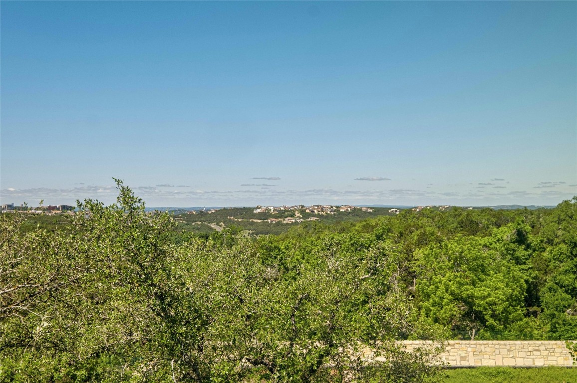 12001 Vista Parke Drive, Unit 702 Austin, TX 78726 - Photo 28 of 33 a view of a field with an ocean