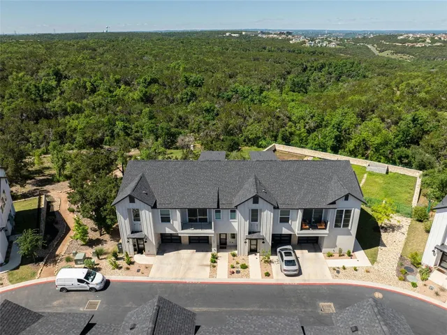an outdoor space with furniture and garden view