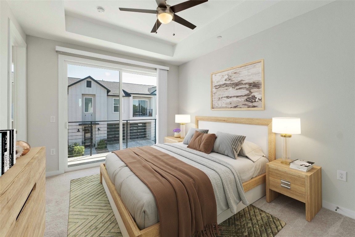 12001 Vista Parke Drive, Unit 702 Austin, TX 78726 - Photo 3 of 33 a bedroom with a large bed and a window