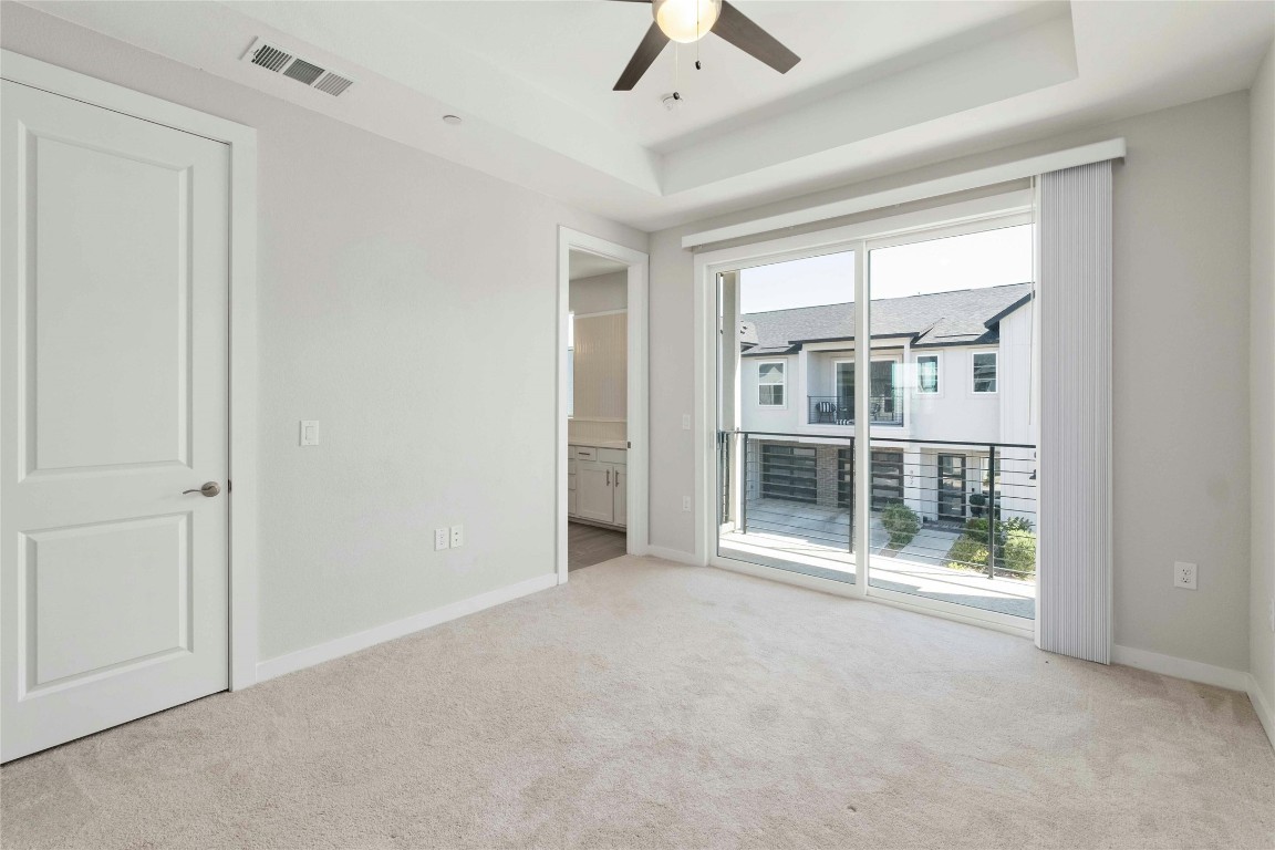 12001 Vista Parke Drive, Unit 702 Austin, TX 78726 - Photo 8 of 33 an empty room with windows