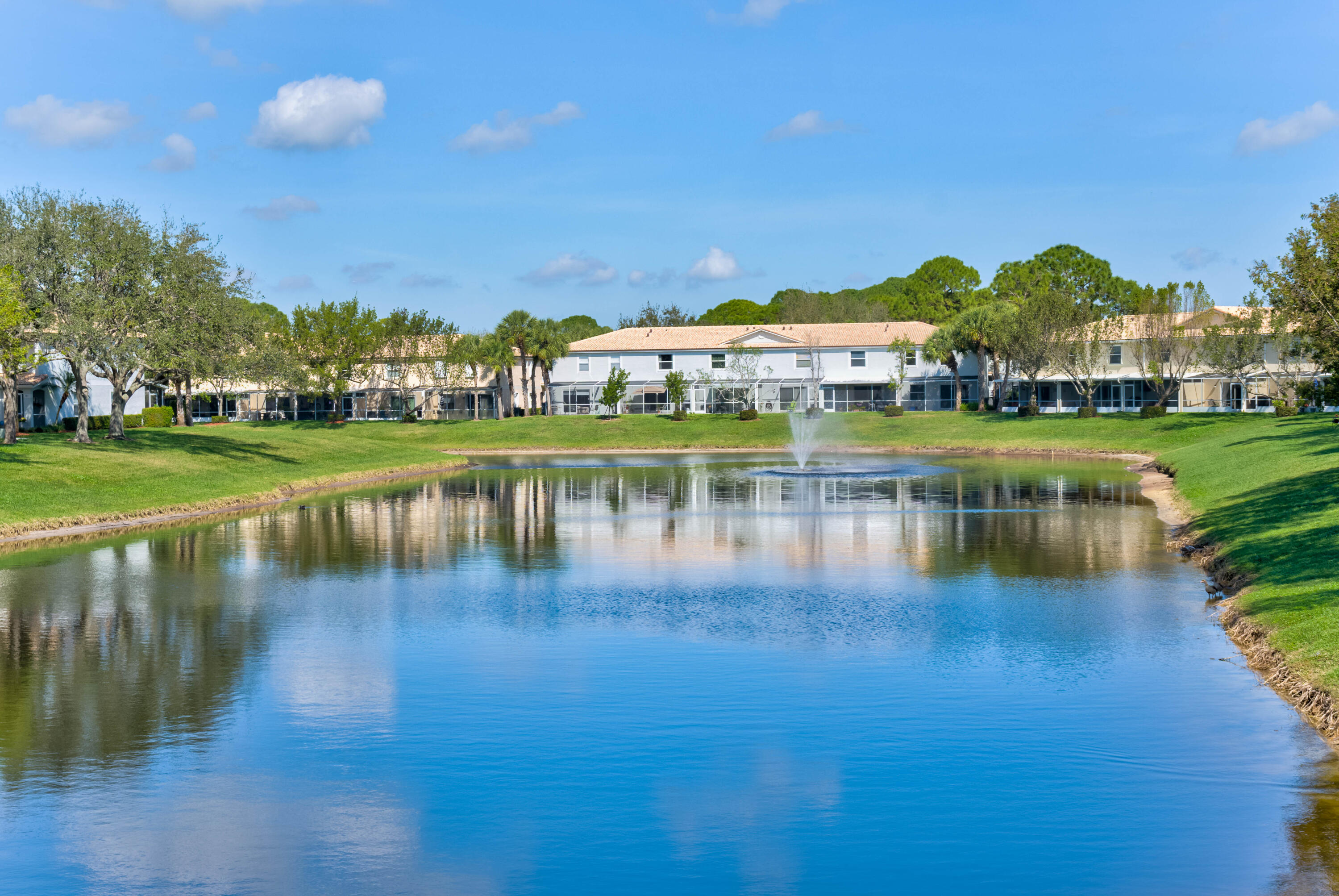 159 Fox Meadow Run Jupiter, FL 33458 - Photo 3 of 37 Community Pool overlooks the lake