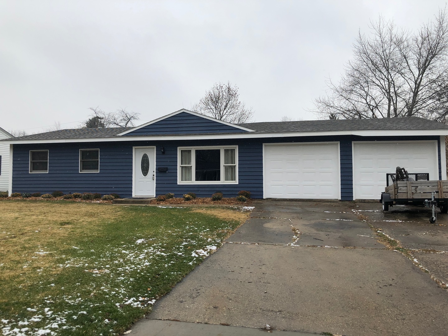 29 Surrey Road Montgomery, IL 60538 - Photo 1 of 26 a front view of a house with a garden and parking space