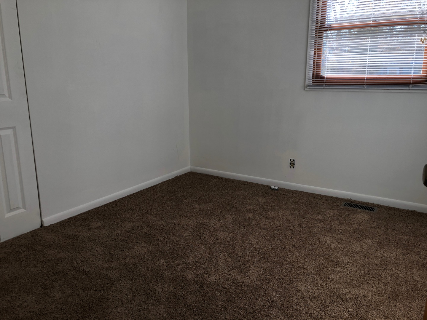 29 Surrey Road Montgomery, IL 60538 - Photo 14 of 26 a view of a small space with wooden floor and a window