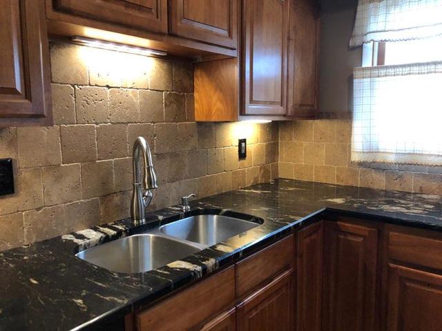 29 Surrey Road Montgomery, IL 60538 - Photo 3 of 26 a kitchen with a sink and cabinets