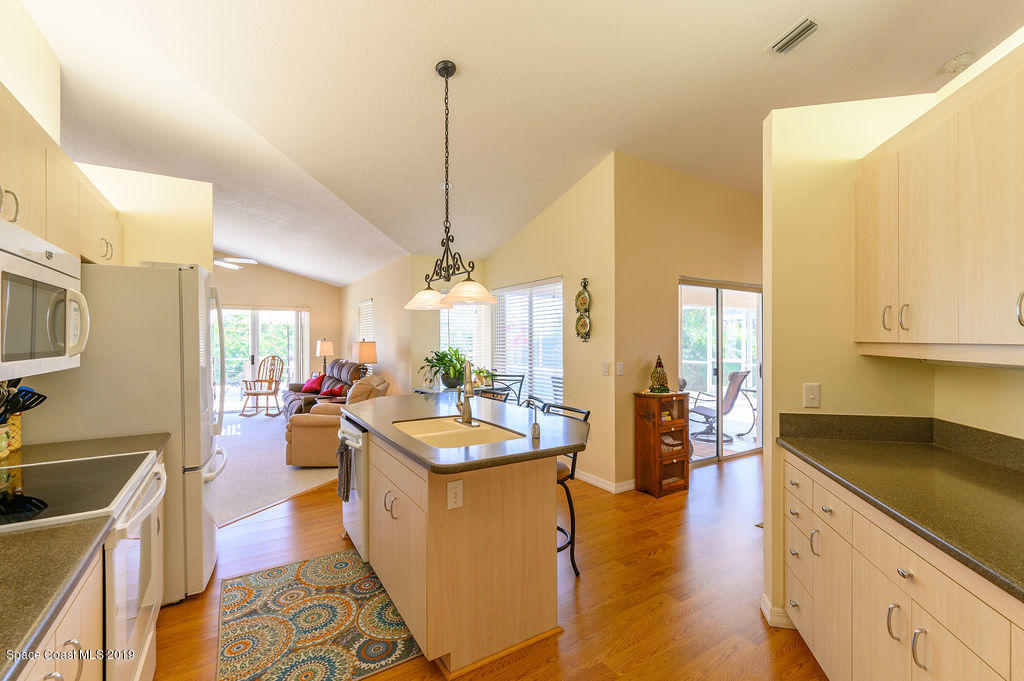 3525 Shady Run Road Melbourne, FL 32934 - Photo 14 of 32 a very nice looking dining room with a large window